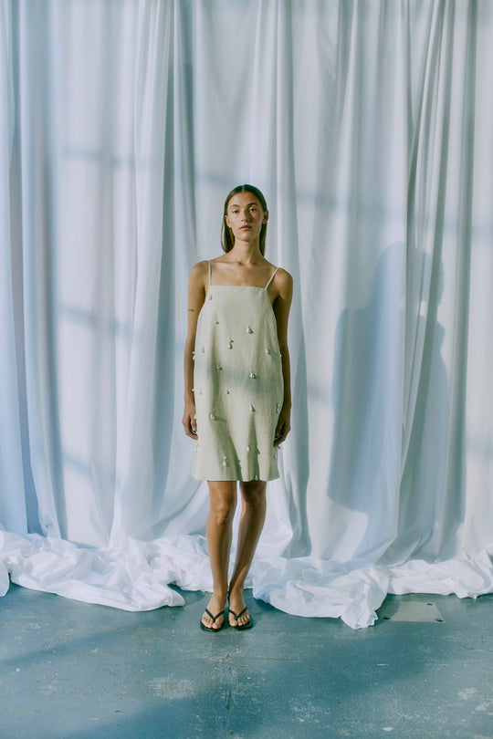 CMMELAN - DRESS WITH PEARLS IN BEIGE