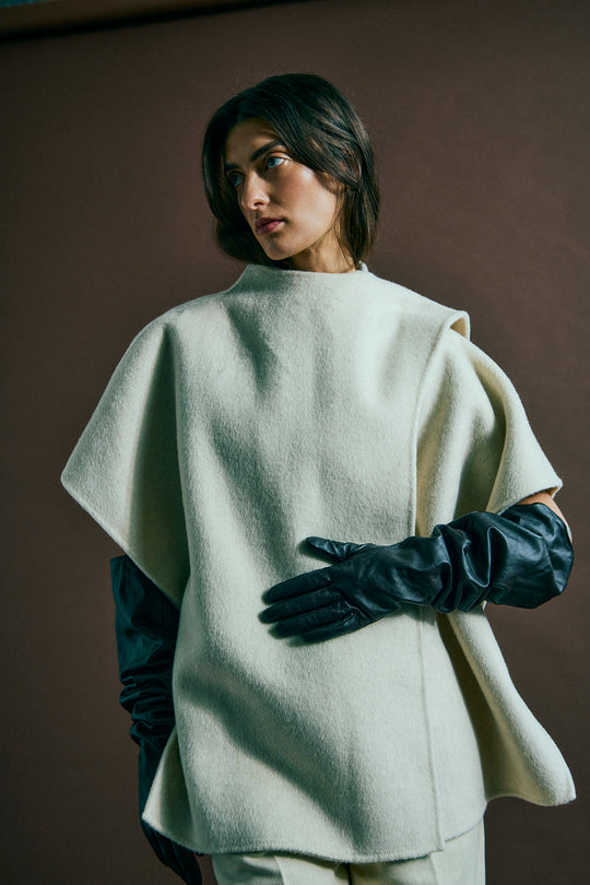 CMWOON – OVERSIZED CAPE IN BEIGE