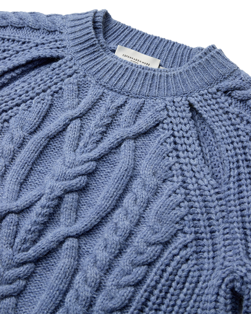 Cmyari - gebreide pullover in blauw