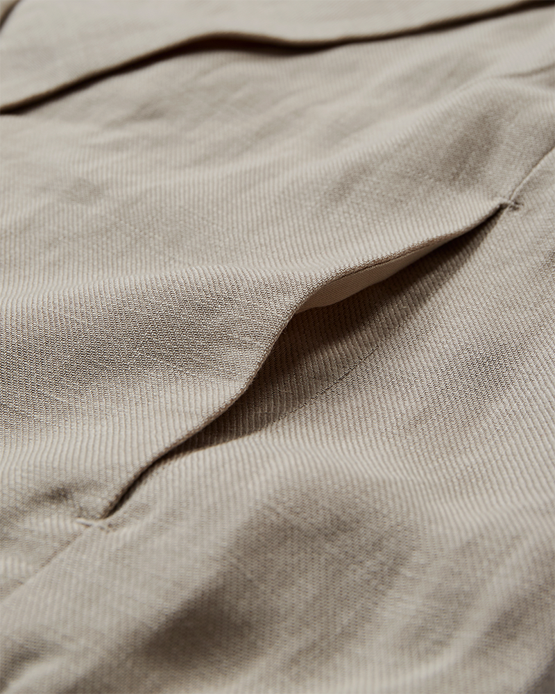 CMNATULI - WAISTCOAT WITH ELASTICATED HEMLINE IN BEIGE