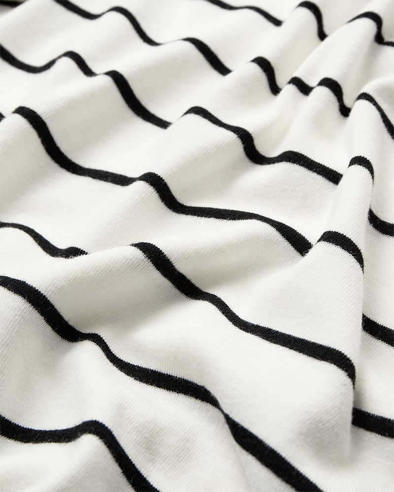 CMMUSE - POLO WITH STRIPES IN OFF-WHITE AND BLACK