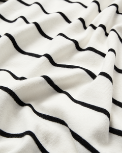 CMMUSE - POLO WITH STRIPES IN OFF-WHITE AND BLACK